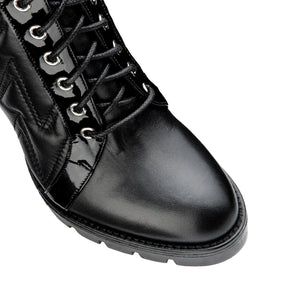 VALENTINO Lace up ankle boots in black faux leather matelassé