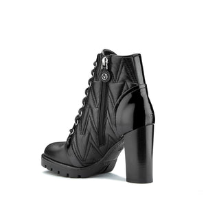 VALENTINO Lace up ankle boots in black faux leather matelassé